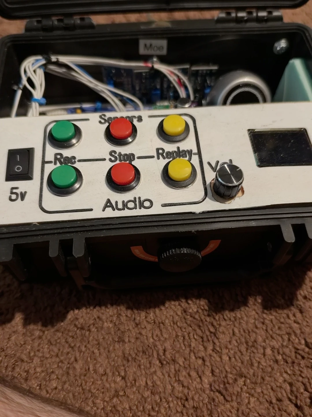 Inside KITT: separate Sensors and Audio rows with green Record, red Stop and yellow Replay buttons, a volume knob and a small display